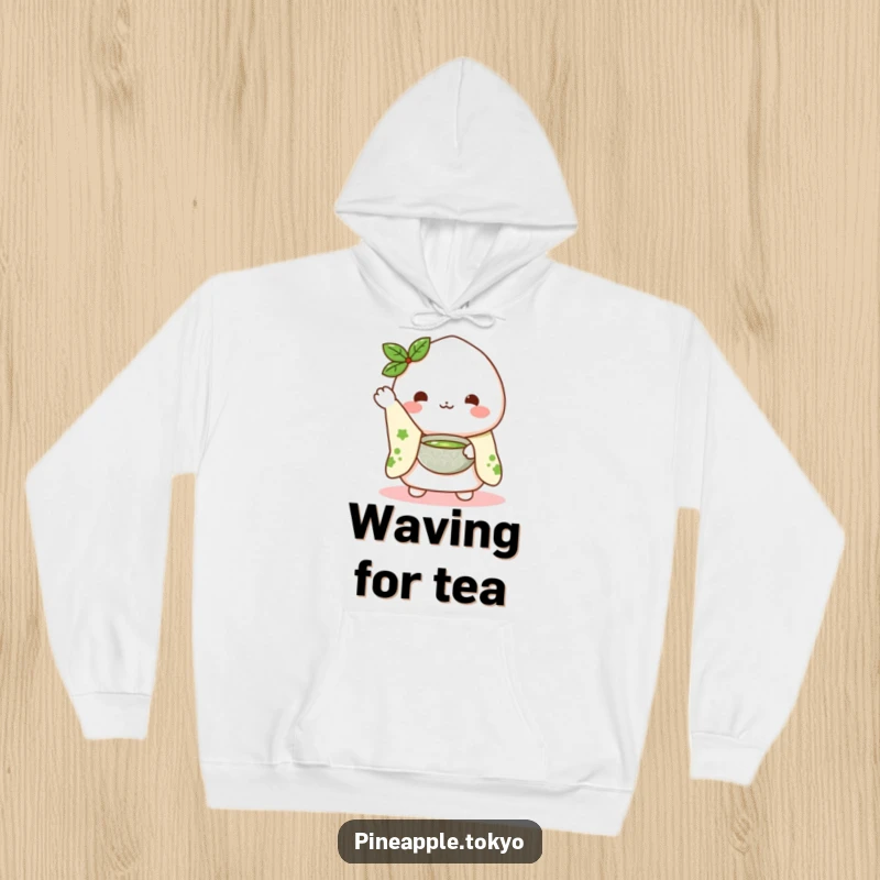 Funny Mochi Matcha Hoodie: a cute mochi character in a kimono sleeve waving hello while presenting a matcha bowl, soft and warm.