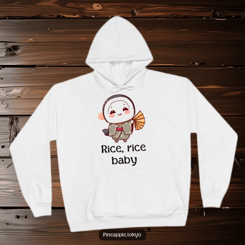 Funny sushi roll wearing a patterned kimono, bowing gracefully with a fan, on a soft hoodie.