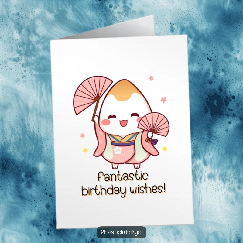 Funny free printable birthday card: A cheerful onigiri character in a festive kimono joyfully holds a decorative fan.