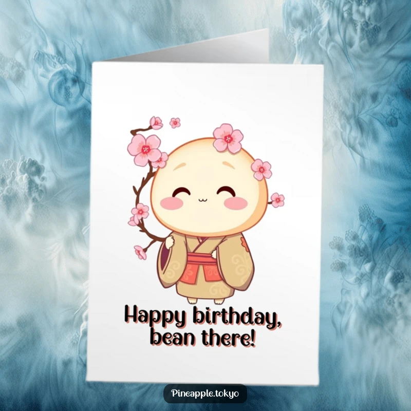 Funny Free Printable Birthday Card: Round dorayaki in ceremonial kimono offering a delicate blooming cherry blossom for a happy birthday.