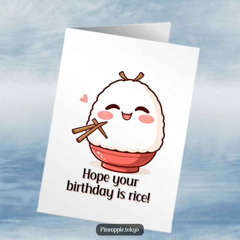 Funny Free Printable Onigiri Birthday Card: A smiling, blushing onigiri winks playfully while holding chopsticks, sending birthday cheer.