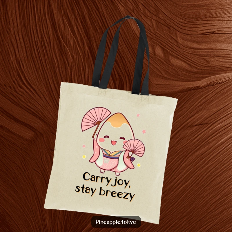 Funny tote bag showcasing a cheerful onigiri in a festive kimono, joyfully holding a fan, perfect for carrying daily essentials.